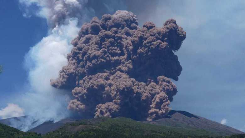 Panoramic View of Mount Etna Erupting with Ash Plume and Sicilian Landscape in the Background