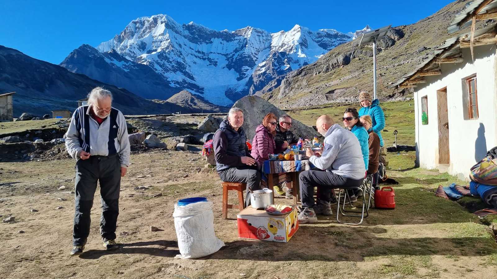Having breakfast at the Upis Camp on the Ausangate and Rainbow Mountain route.