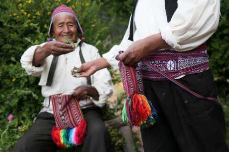 Sharing the coca leaves on the taquile island tour
