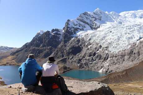 Rest during the ascent to the Apacheta Pass of Rainbow Mountain