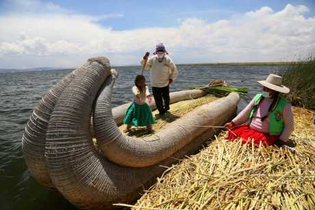 Tour to the Uros Islands with totora reed raft